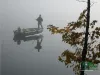 Computer screen wallpaper: Fishing a lake in the dense fog
